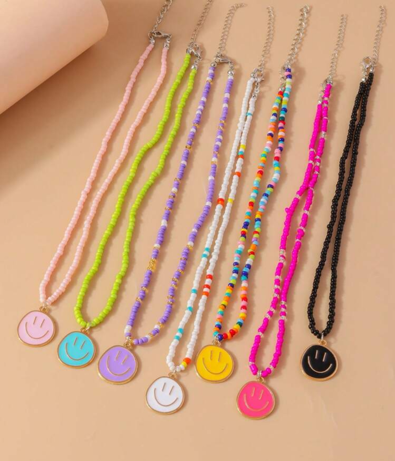 7 قلادات من الخرز بوجه مبتسم بسعر الجملة
